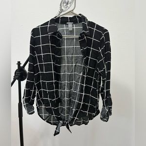 Woman’s buttoned down knotted blouse